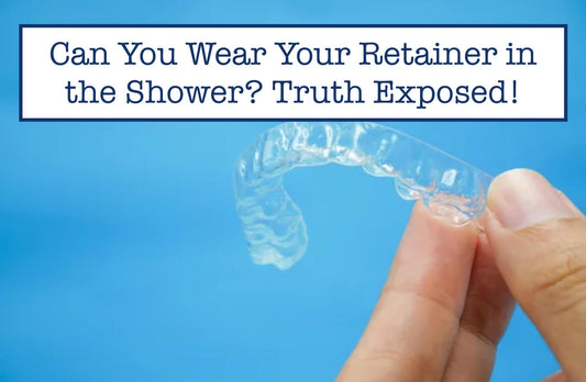 holding a clear retainer 