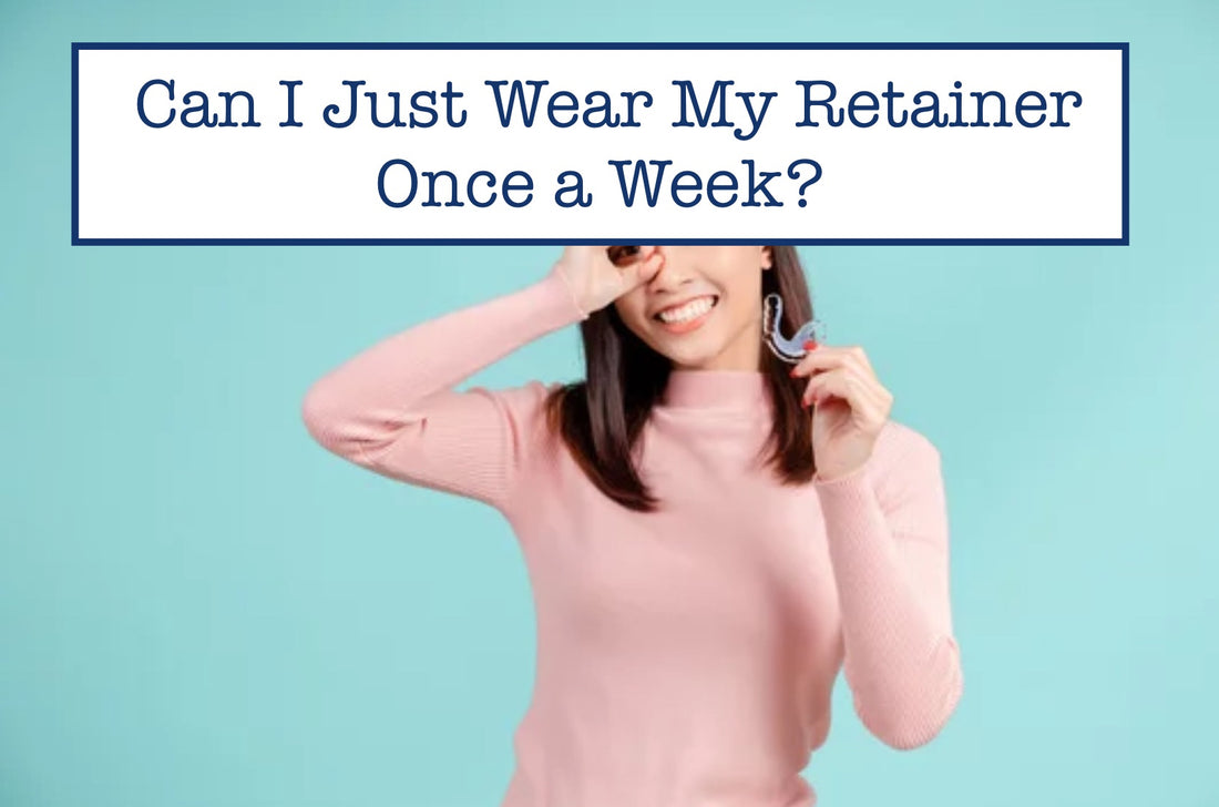 girl smiling while holding a retainer