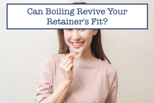 girl smiling while holding a retainer